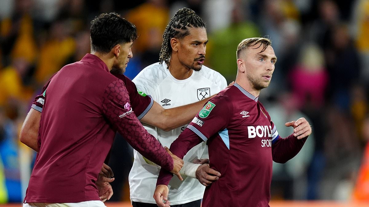 West Ham captain Jarrod Bowen has to be pulled away from furious row with travelling fans after Graham Potter's struggling side's late collapse at Wolves