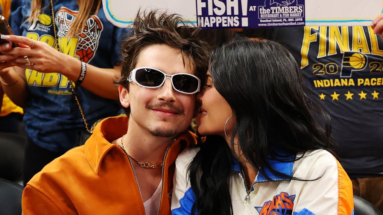 Kylie Jenner and Timothée Chalamet appear at the basketball game in matching fan outfits