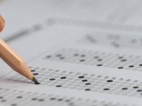 Why was the ICFES exam suspended in some municipalities in Colombia?
