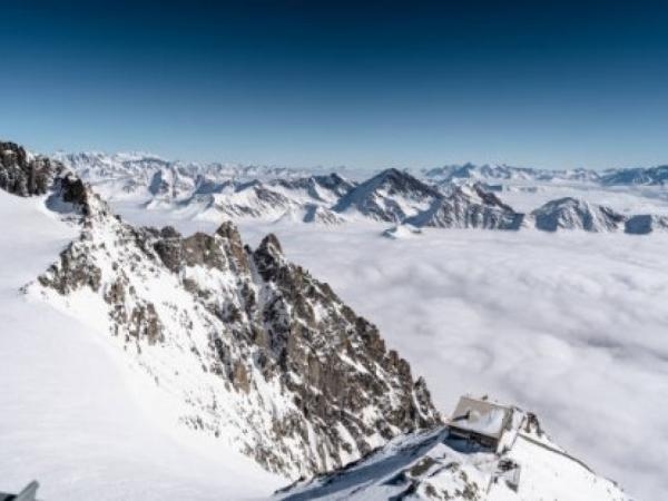 Why does it feel cold instead of hot when you climb a mountain and are closer to the sun?